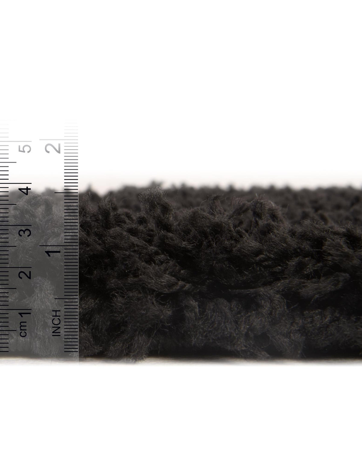 Rechteck Hochflorteppich Solid Shag in Schwarz von Hadorn™ - Lifestyle Image