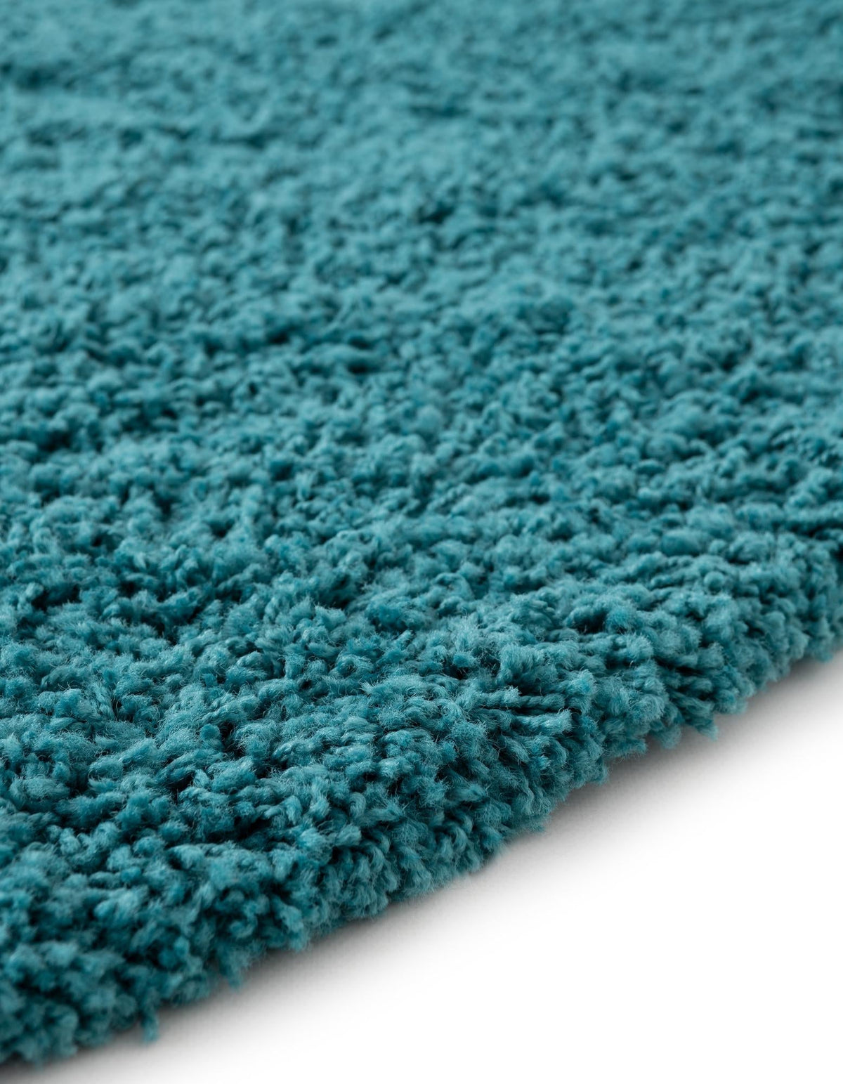 Rund Hochflorteppich Solid Shag in Dunkelblau von Hadorn™ - Lifestyle Image