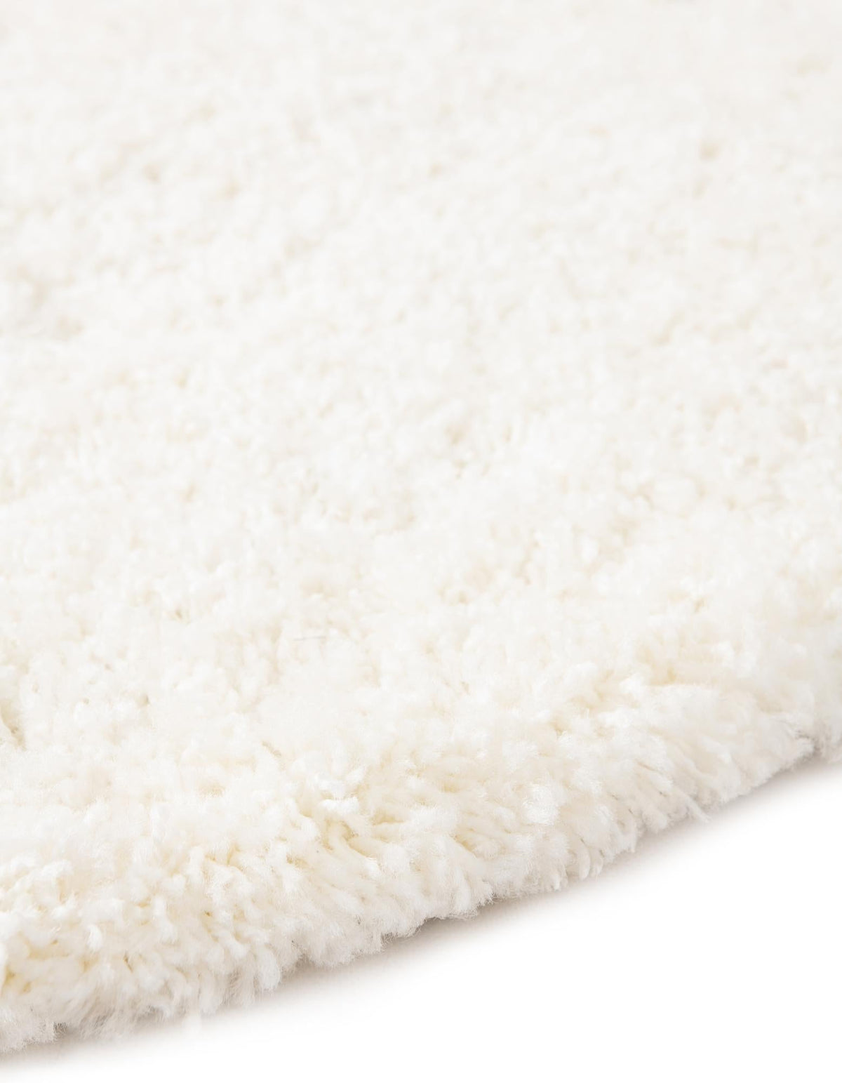 Rund Hochflorteppich Solid Shag in Weiss von Hadorn™ - Lifestyle Image
