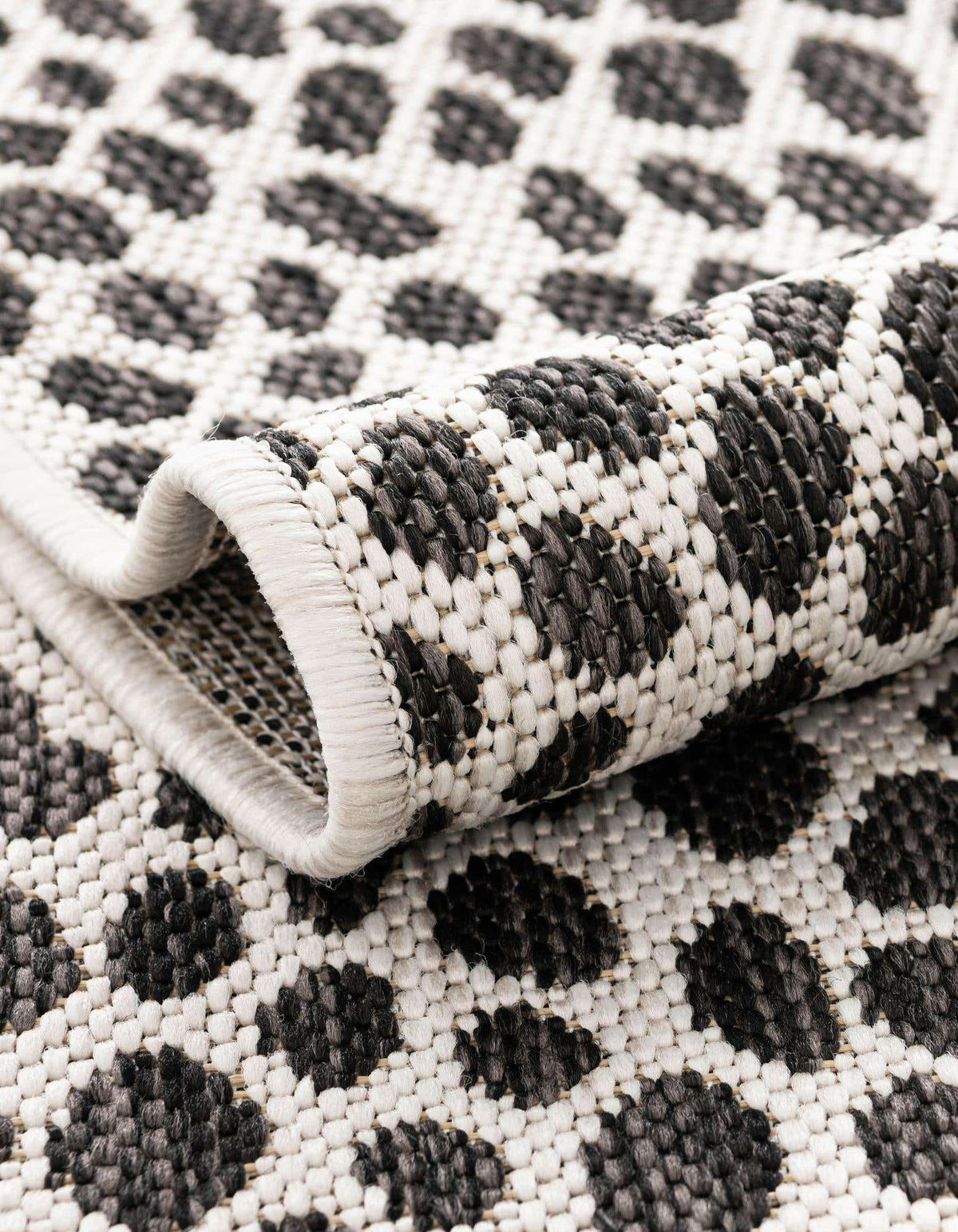 Rund Outdoor Teppich Tulum Outdoor in Schwarz von Hadorn™ - Lifestyle Image