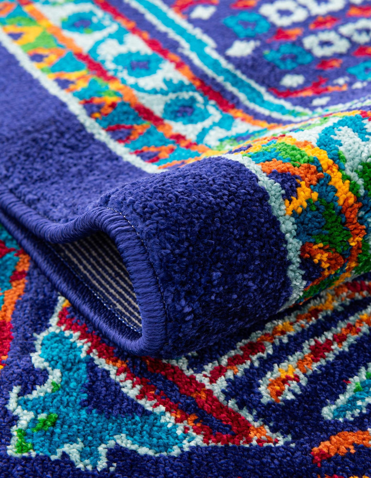 Quadratisch Teppich Calypso in Marineblau von Hadorn™ - Lifestyle Image