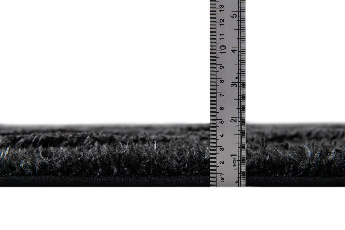 Rechteck Teppich Thun Tribus in Schwarz von Hadorn™ - Lifestyle Image