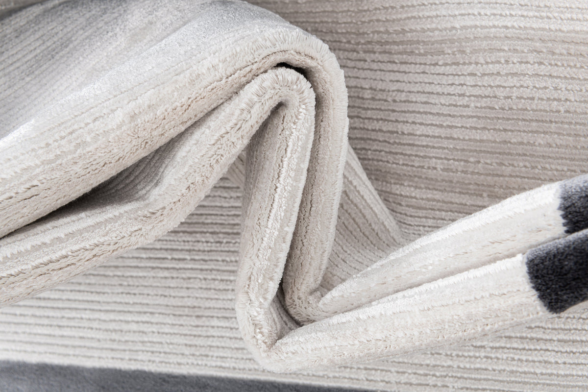 Rund Luxus Teppich Chiasso in Hellgrau von Hadorn™ - Lifestyle Image